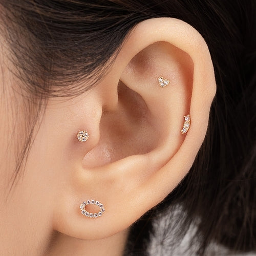 Solid gold oval piercing
