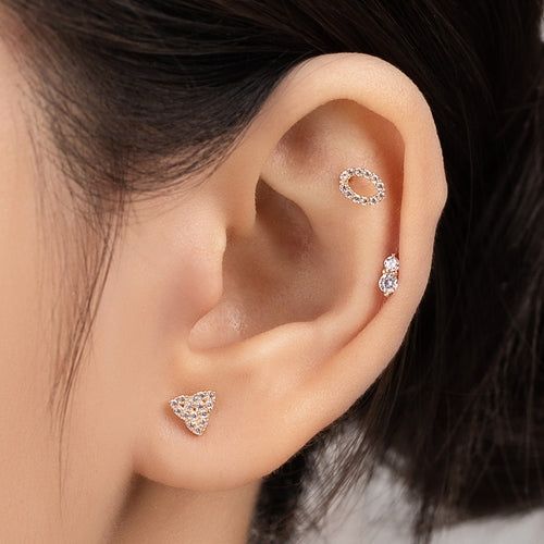 Solid gold oval piercing