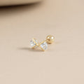 Solid gold cubic bow piercing